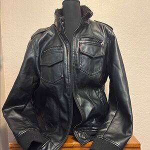 Sleek Black Leather Jacket with Zipper Accents